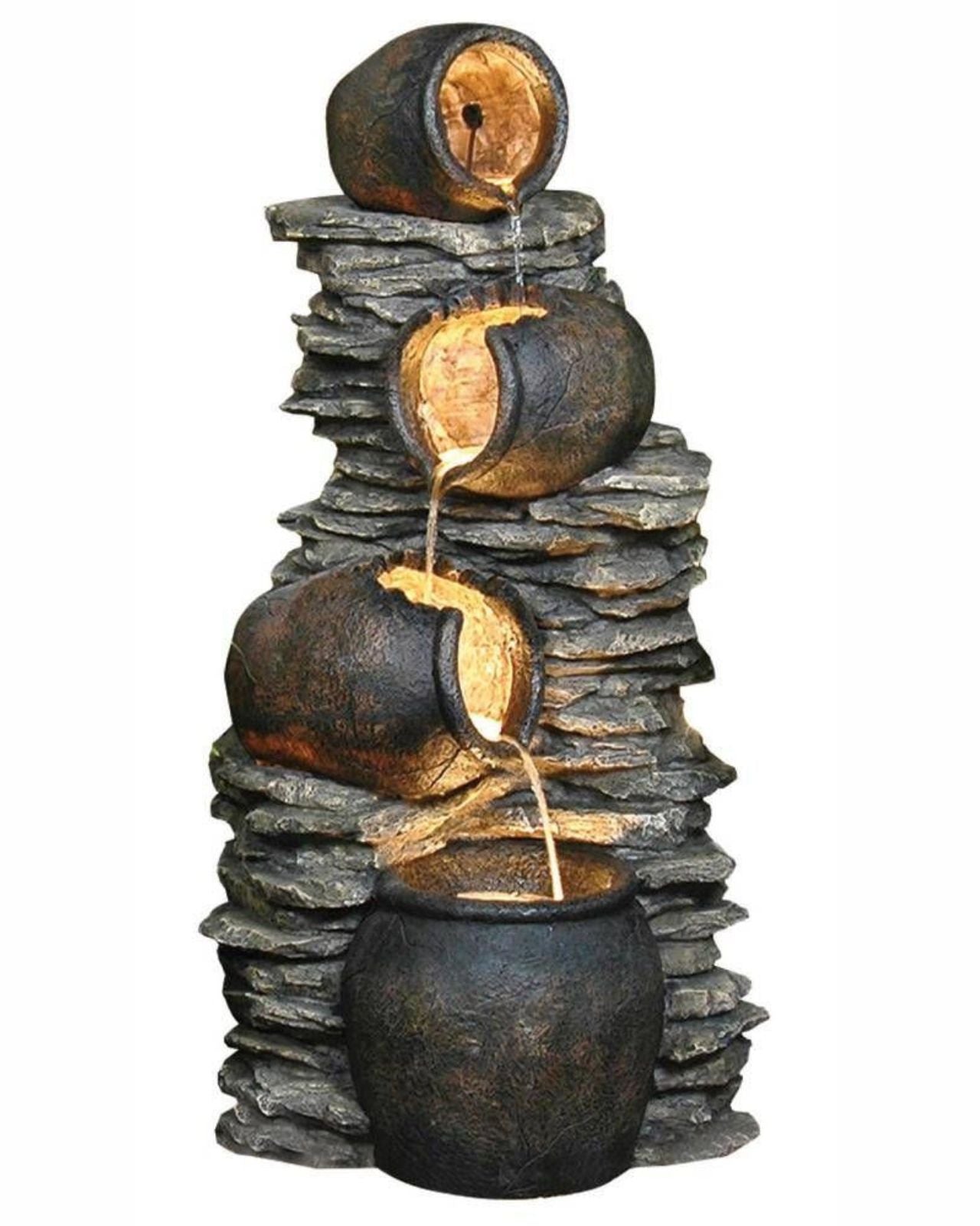 Decorative stone water fountain with stacked stones and glowing interior on a white background