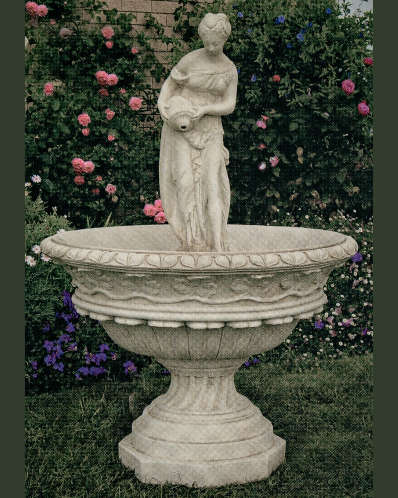 1 tier concrete water fountain in a garden