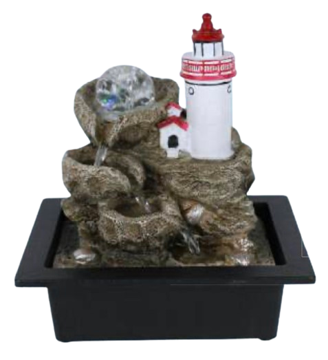 A miniature lighthouse and rock waterfall tabletop fountain in a rectangular black tray.