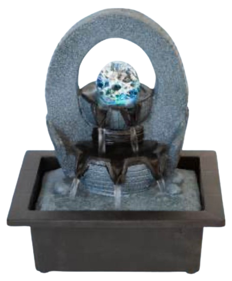 A small decorative tabletop fountain with a gray stone arch.