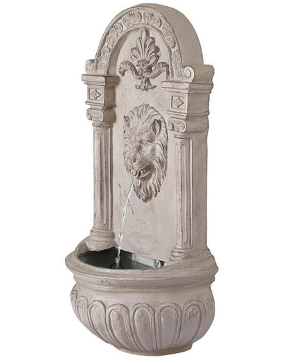 Decorative wall fountain with lion head design on a white background