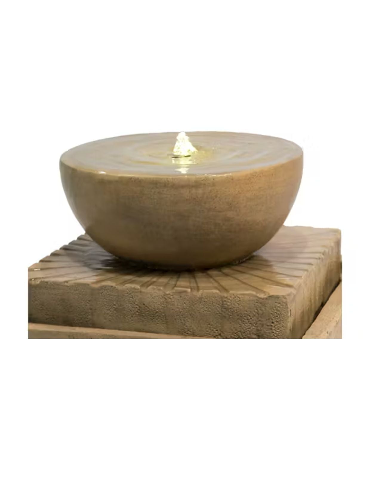 Decorative stone bowl fountain with a light inside on a matching stone base 