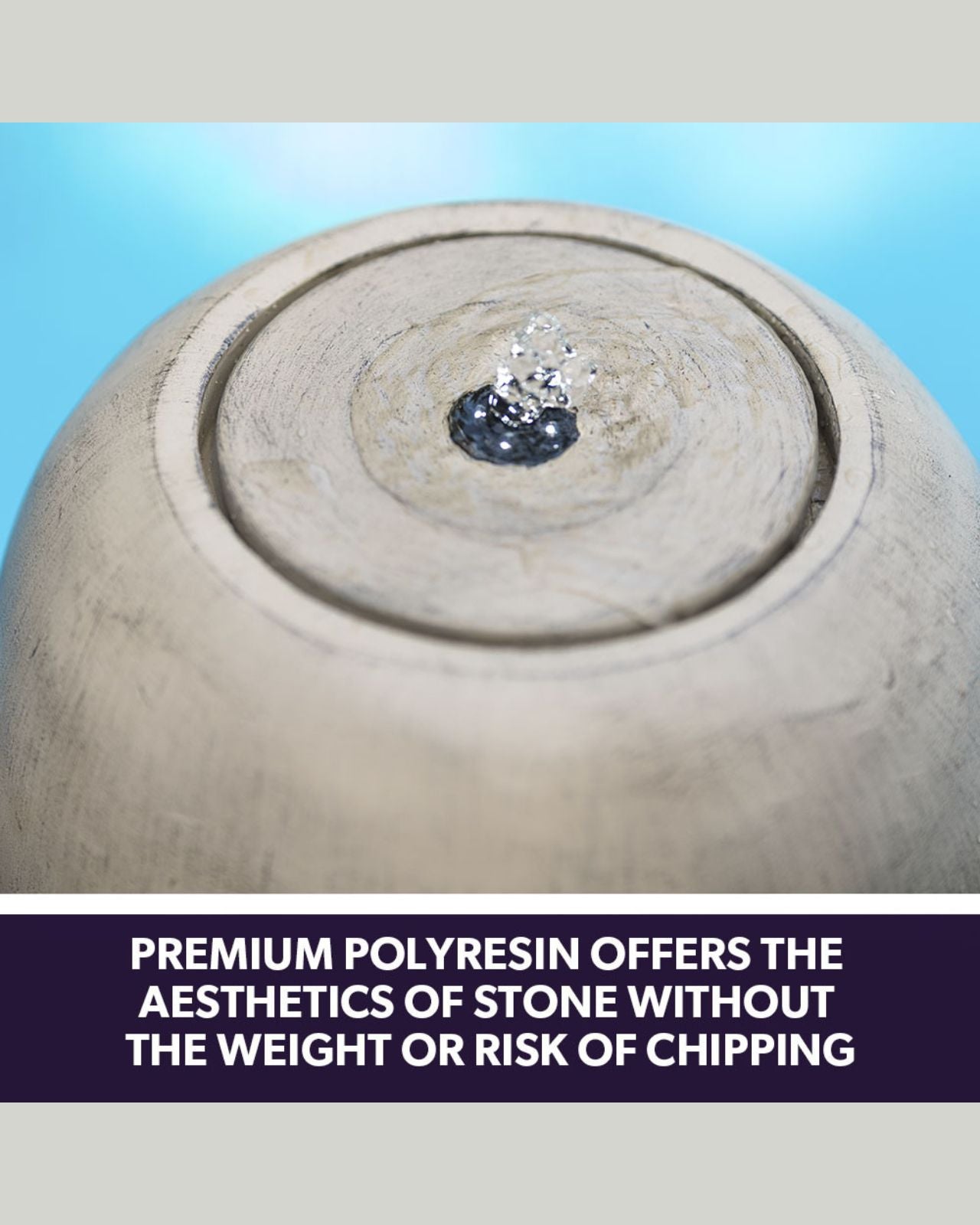 Close-up of a stone-like water feature with text about premium polyresin