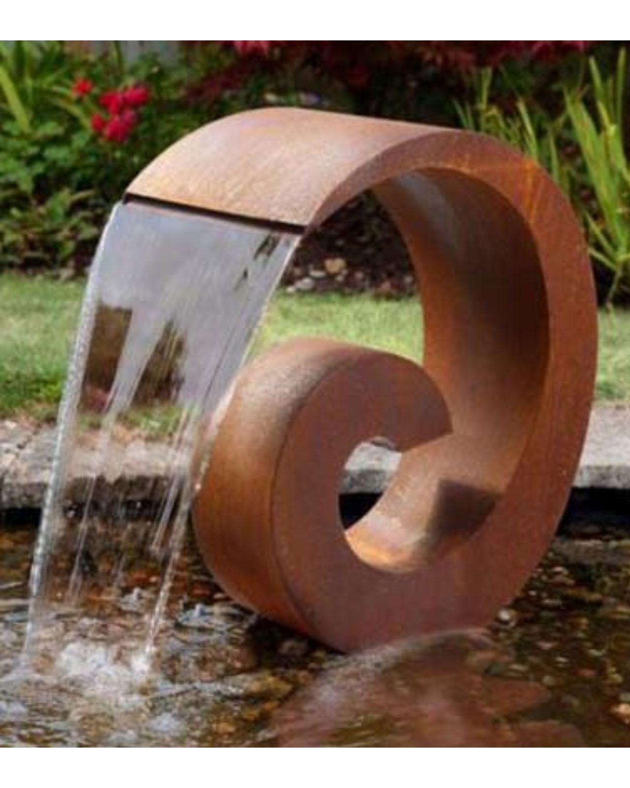 Corten steel spiral water feature in a garden setting with flowing water.