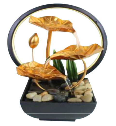 A decorative metal tabletop water fountain with gold-toned lotus leaves and stems.