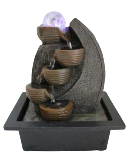 A tiered waterfall fountain with a textured dark gray stone-like body. 