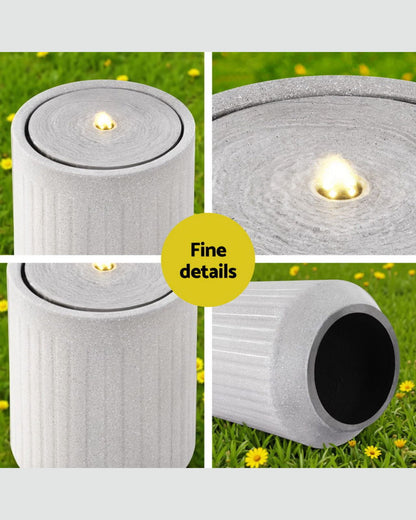 Roll of solar-powered LED lights water feature  on grass with close-up details.