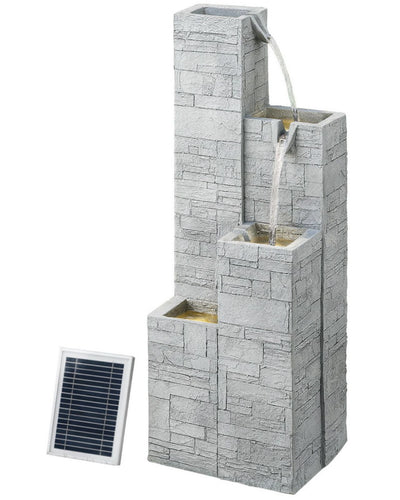 Solar-powered outdoor fountain with stone-like design on a white background