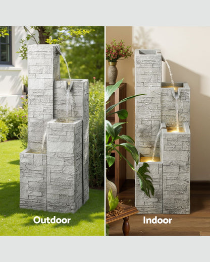 Faux stone water fountain shown outdoors and indoors with plants and decor.