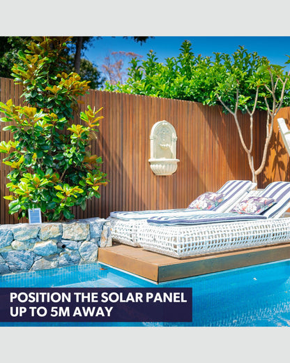 Outdoor setting with a water feature, pool, lounge chair, and solar panel recommendation text.