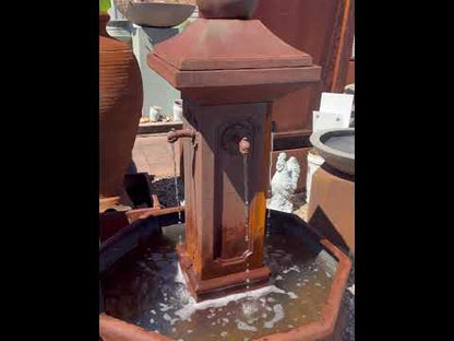 French Stone Dual Spout Pillar Outdoor Water Feature in outdoor setting